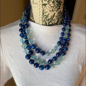 Triple strand of multi blue shades , excellent condition